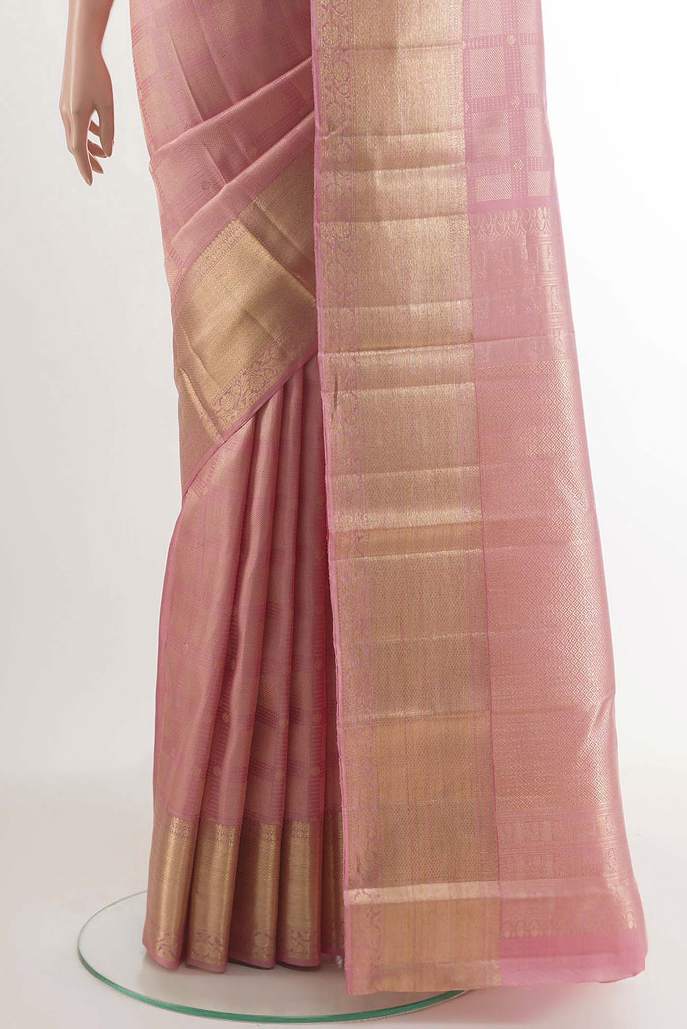 Pleats and pallu of Pink Kanchipuram Silk Saree with Zari Brocade on the body and Zari Border. 