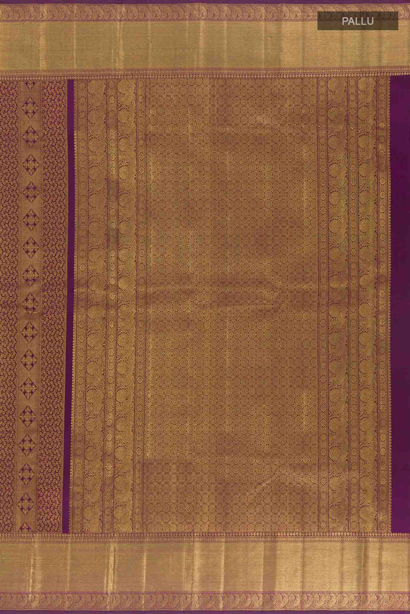 Close up image of the pallu of Purple Kanchipuram Silk Saree with Zari Brocade on the body and Zari Border. 