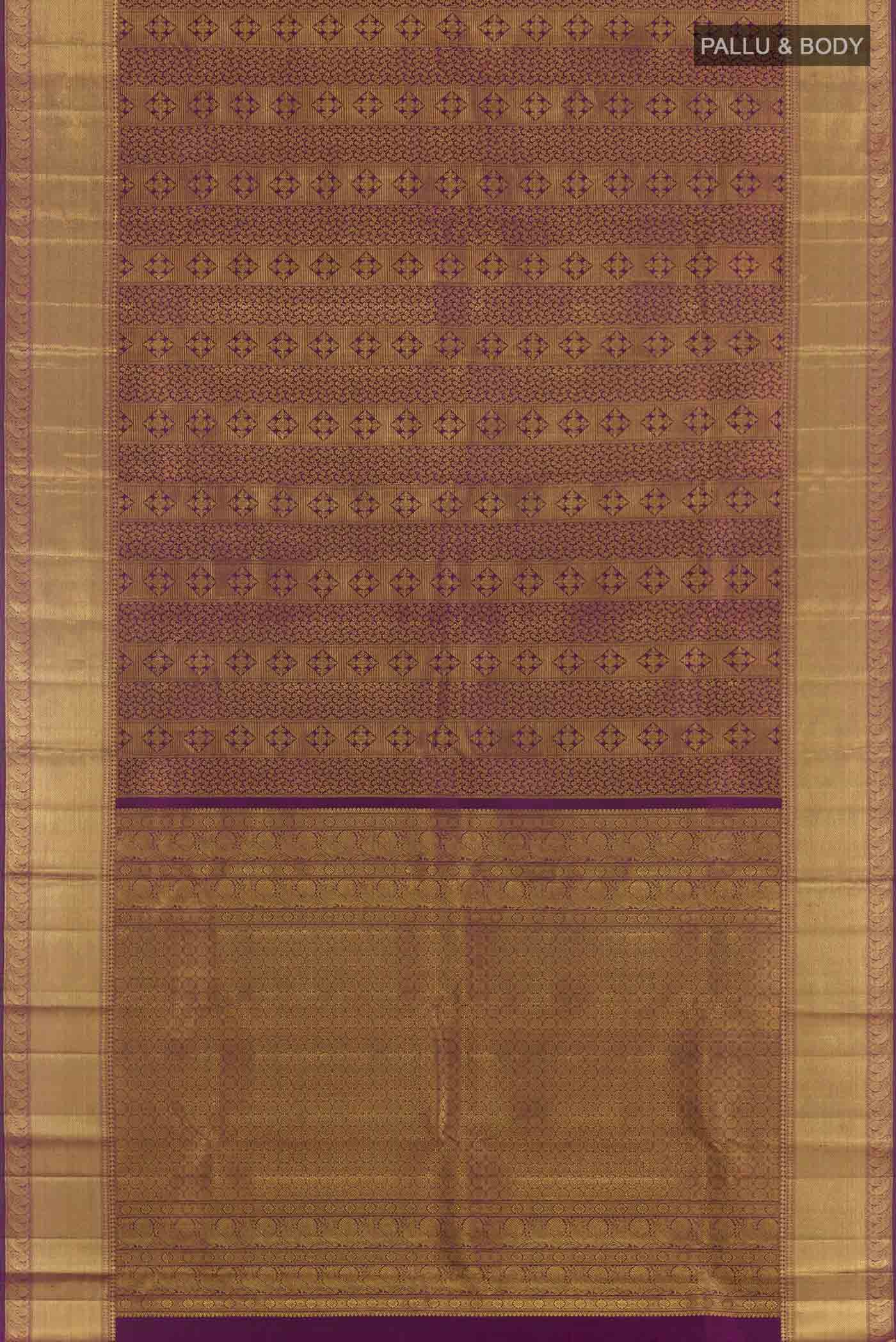 Flat view of Purple Kanchipuram Silk Saree with Zari Brocade on the body and Zari Border. 
