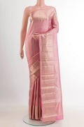 Pink Kanchipuram Silk Saree with Stripes on the body and Zari Border.  displayed on a mannequin