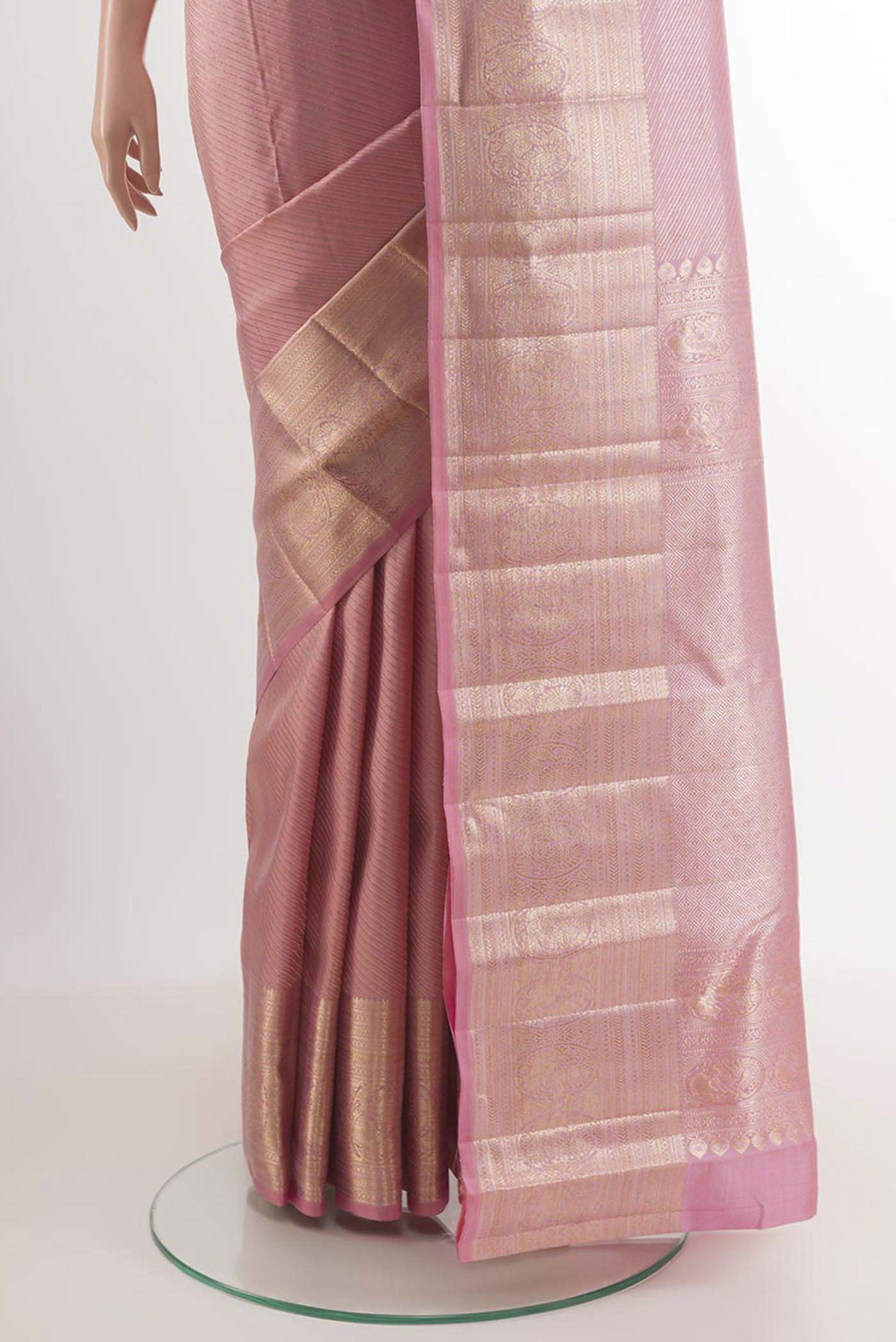 Pleats and pallu of Pink Kanchipuram Silk Saree with Stripes on the body and Zari Border. 