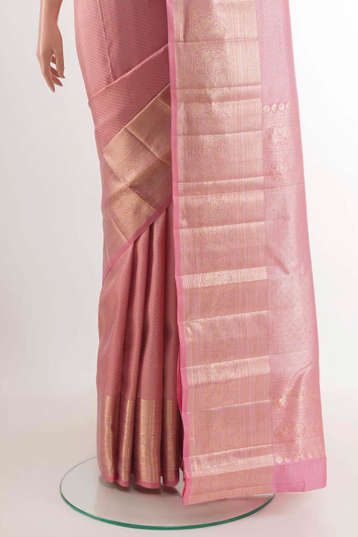 Pleats and pallu of Pink Kanchipuram Silk Saree with Stripes on the body and Zari Border. 
