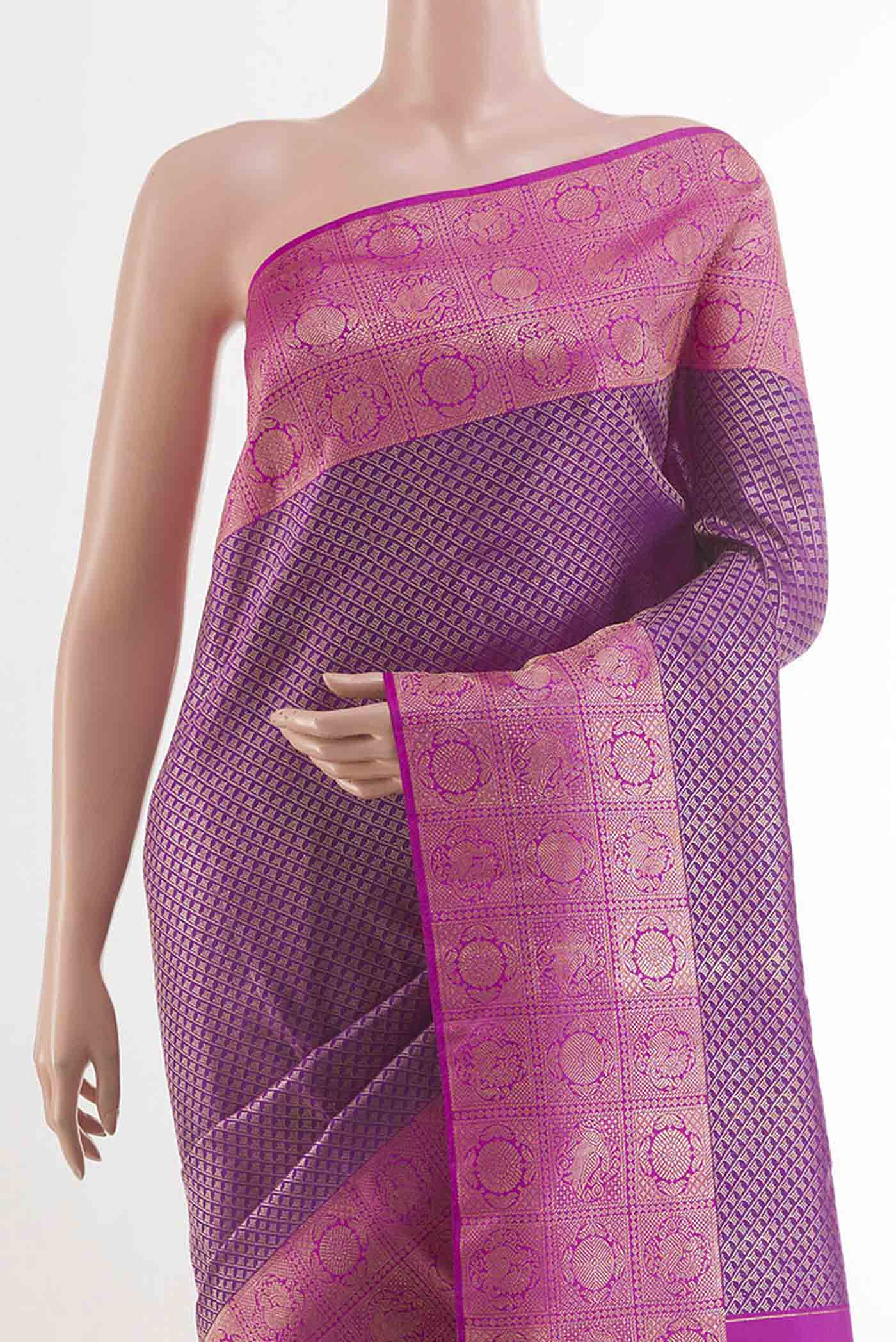 Border image of Purple Kanchipuram Silk Saree with Zari Brocade on the body and Zari Border. 