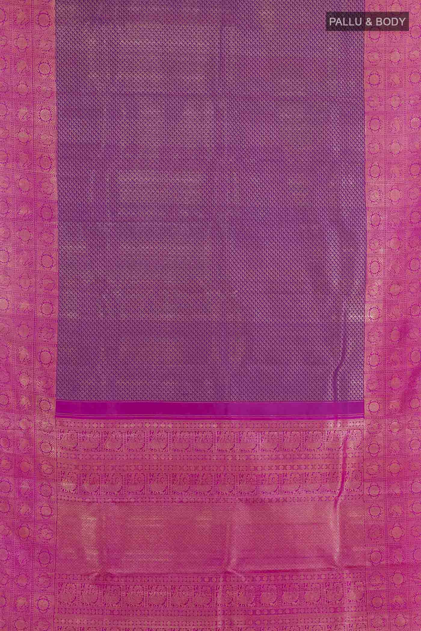 Flat view of Purple Kanchipuram Silk Saree with Zari Brocade on the body and Zari Border. 