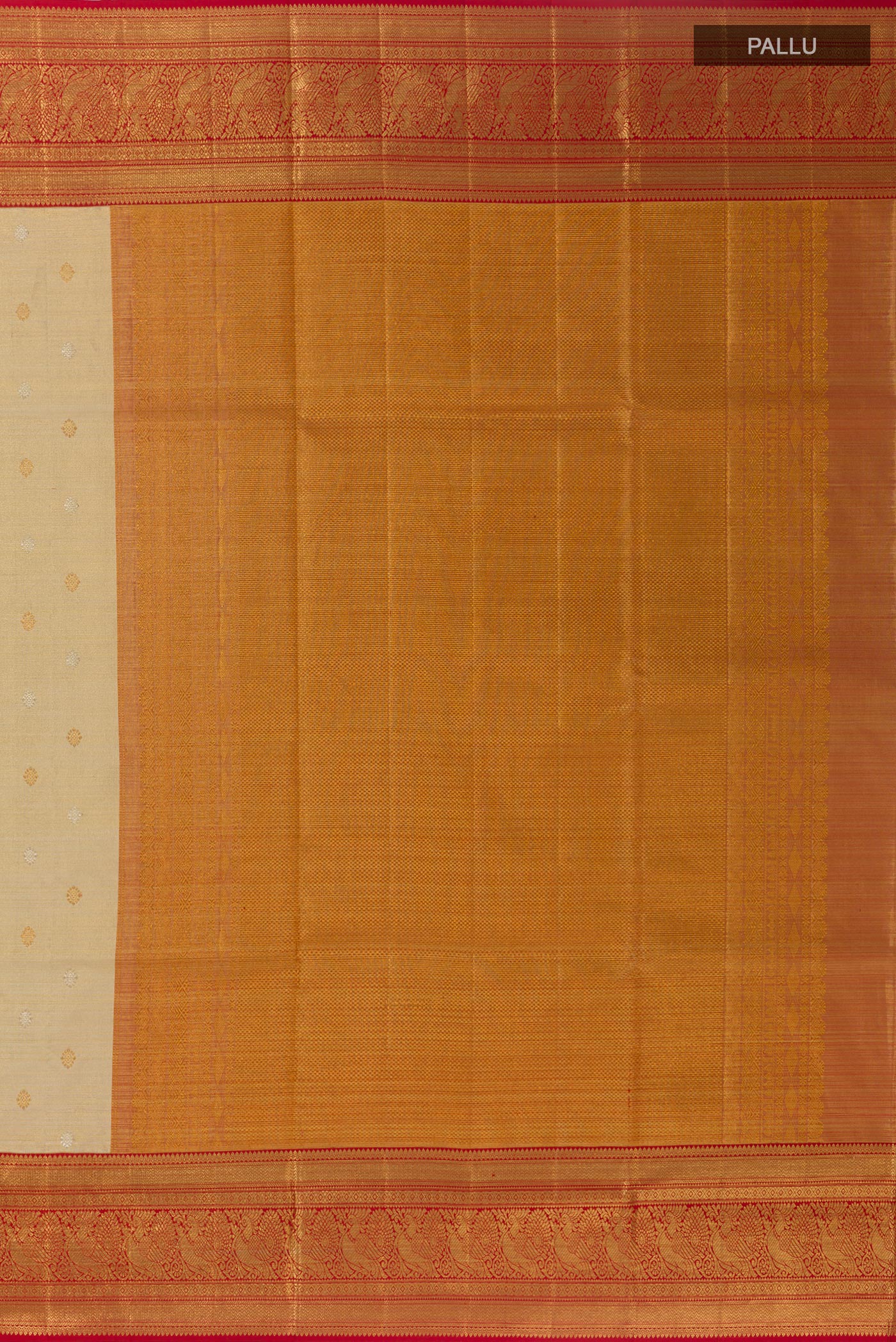 Close up image of the pallu of Golden Kanjivaram Tissue Silk Saree with Zari Butta on the body and Zari Border. 