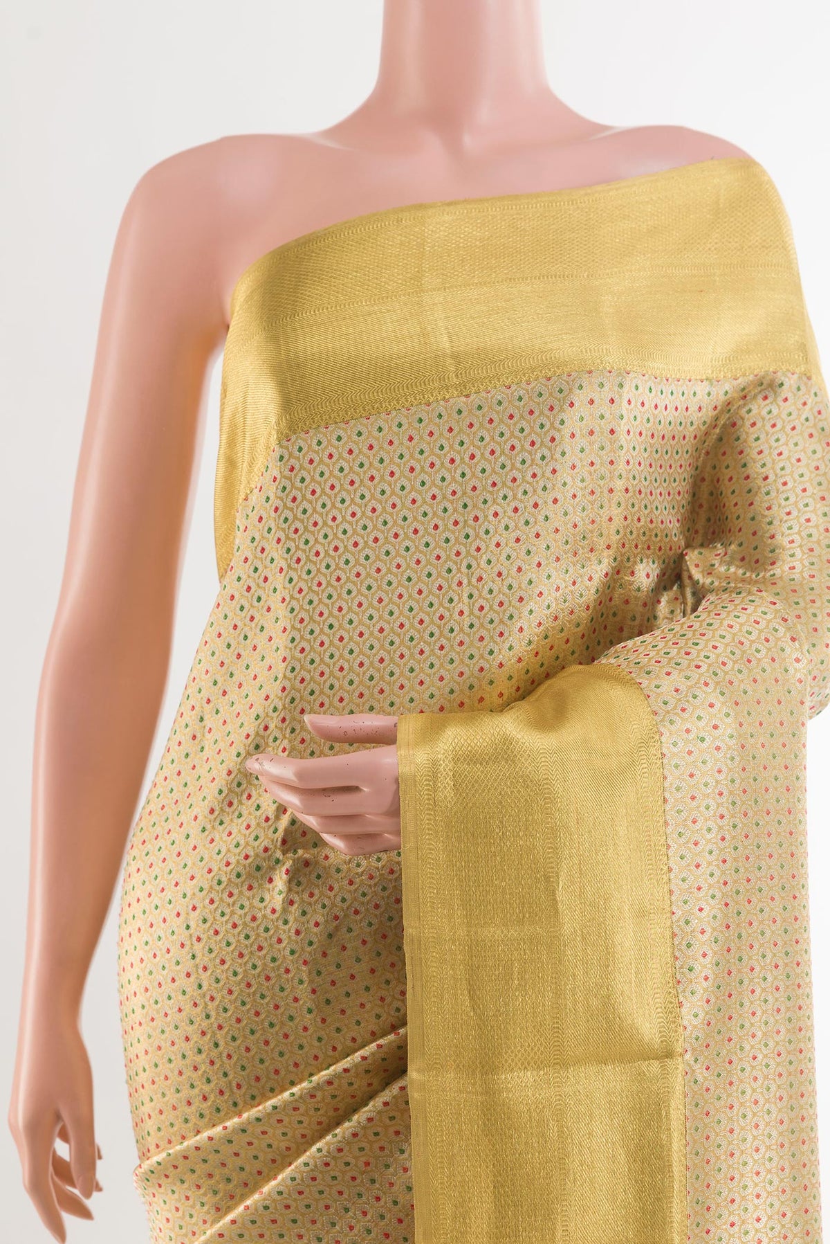 Border image of Golden Kanjivaram Tissue Silk Saree with Zari Brocade on the body and Zari Border. 