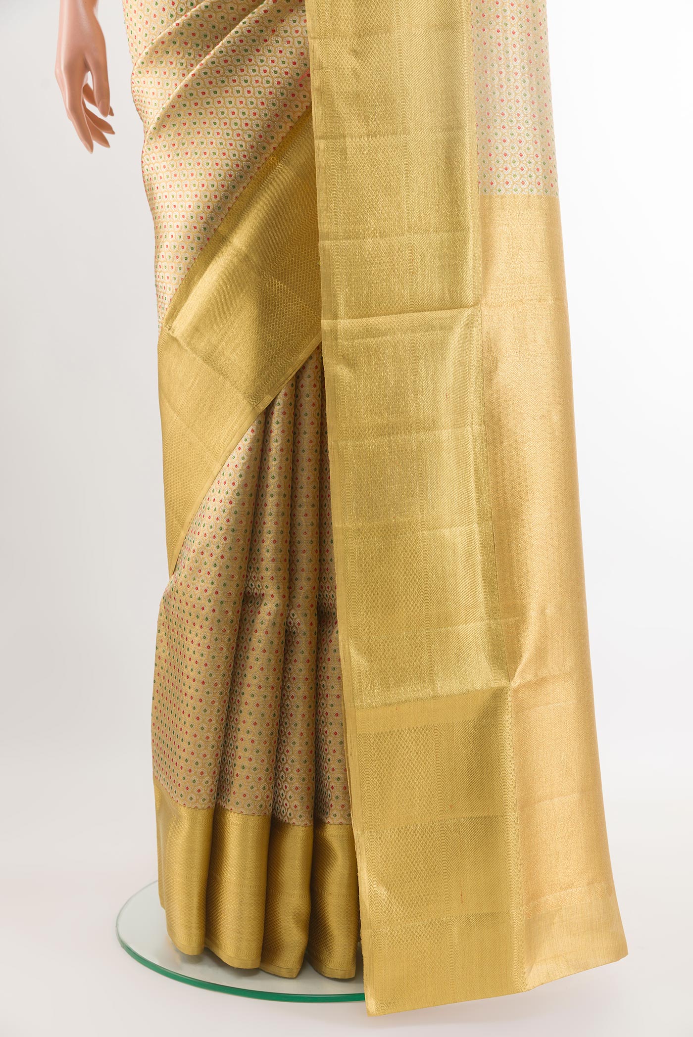 Pleats and pallu of Golden Kanjivaram Tissue Silk Saree with Zari Brocade on the body and Zari Border. 