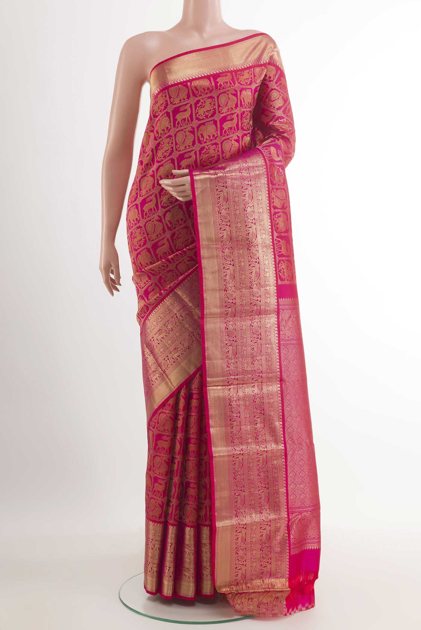 Pink Dual Tone Kanchipuram Silk Saree with Zari Brocade on the body and Zari Border.  displayed on a mannequin