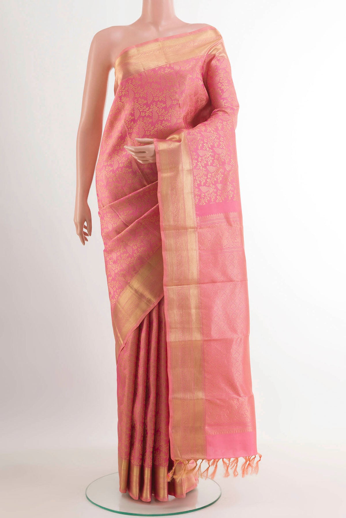 Pink Kanchipuram Silk Saree with Zari Brocade on the body and Zari Border.  displayed on a mannequin