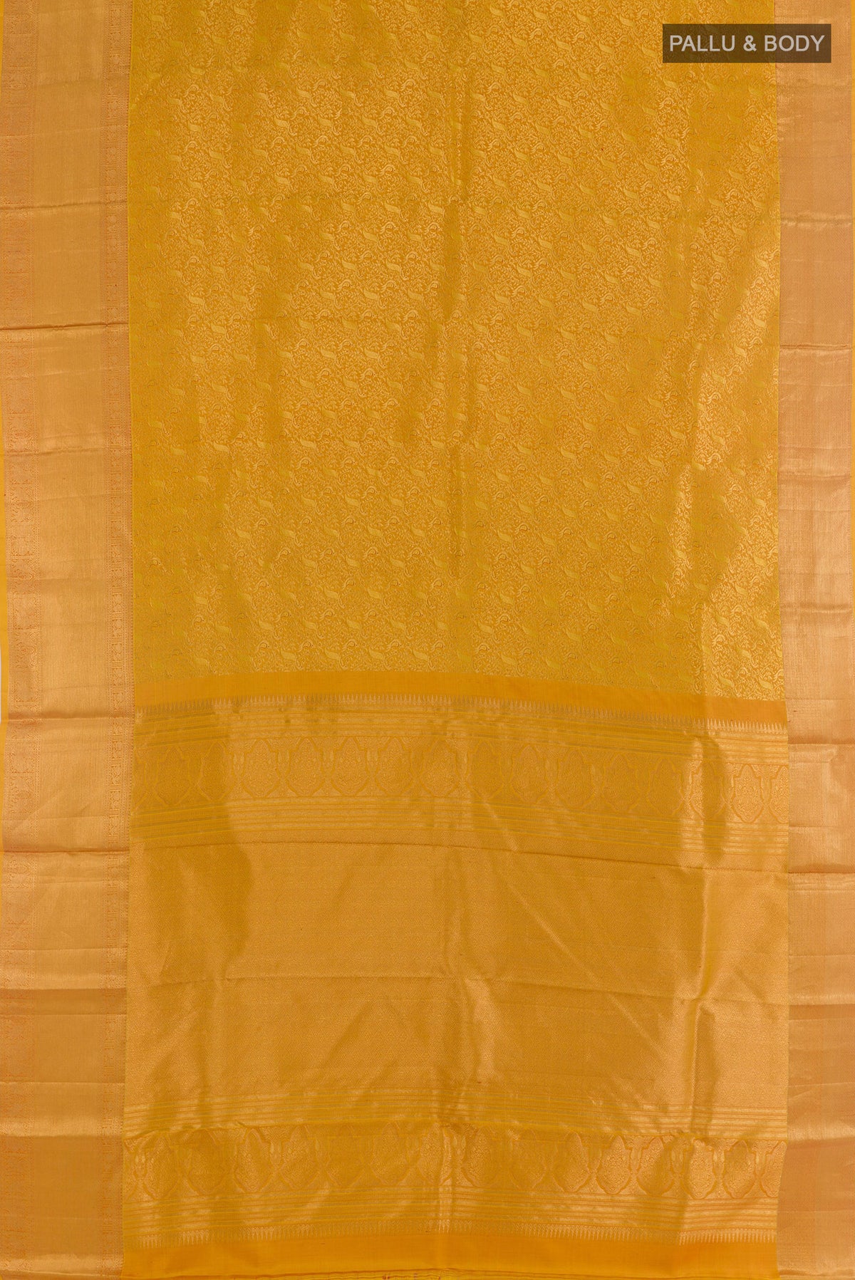Flat view of Pure Silk Mustard Kanchipuram Saree with Zari Brocade on the body and Zari Border. 