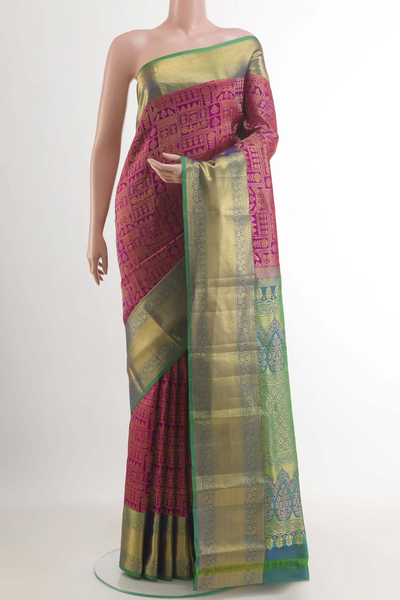 Purple Kanchipuram Silk Saree with Zari Brocade on the body and Zari Border.  displayed on a mannequin