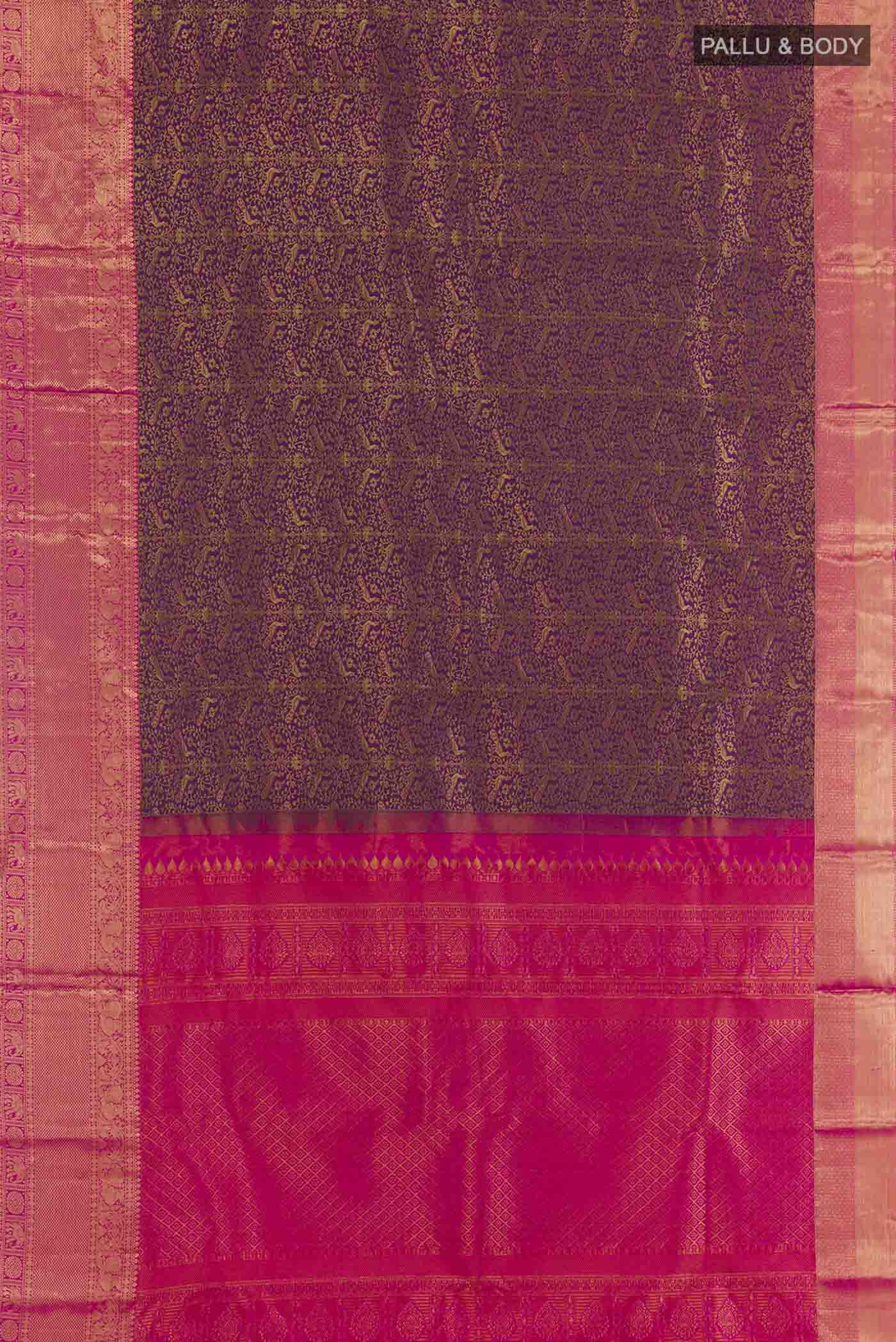 Flat view of Purple Kanchipuram Silk Saree with Zari Brocade on the body and Zari Border. 
