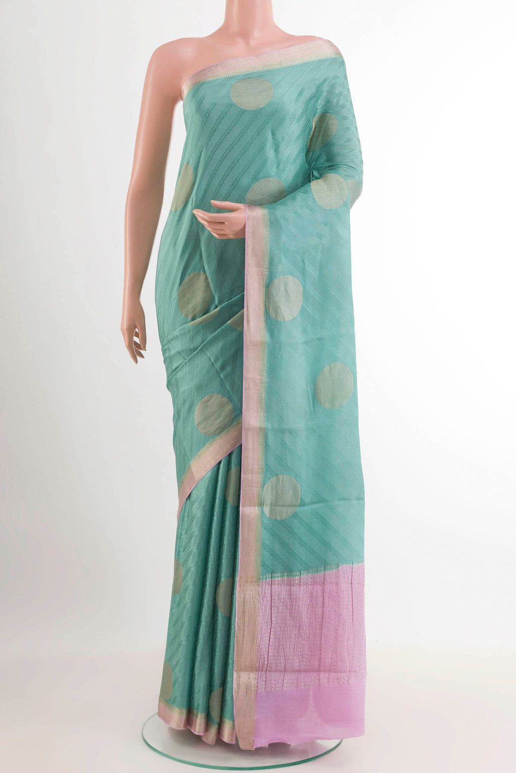 Blue Mysore Crepe Saree with Zari Butta on the body and Zari Border.  displayed on a mannequin