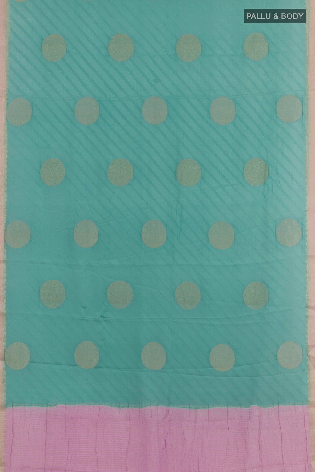 Flat view of Blue Mysore Crepe Saree with Zari Butta on the body and Zari Border. 