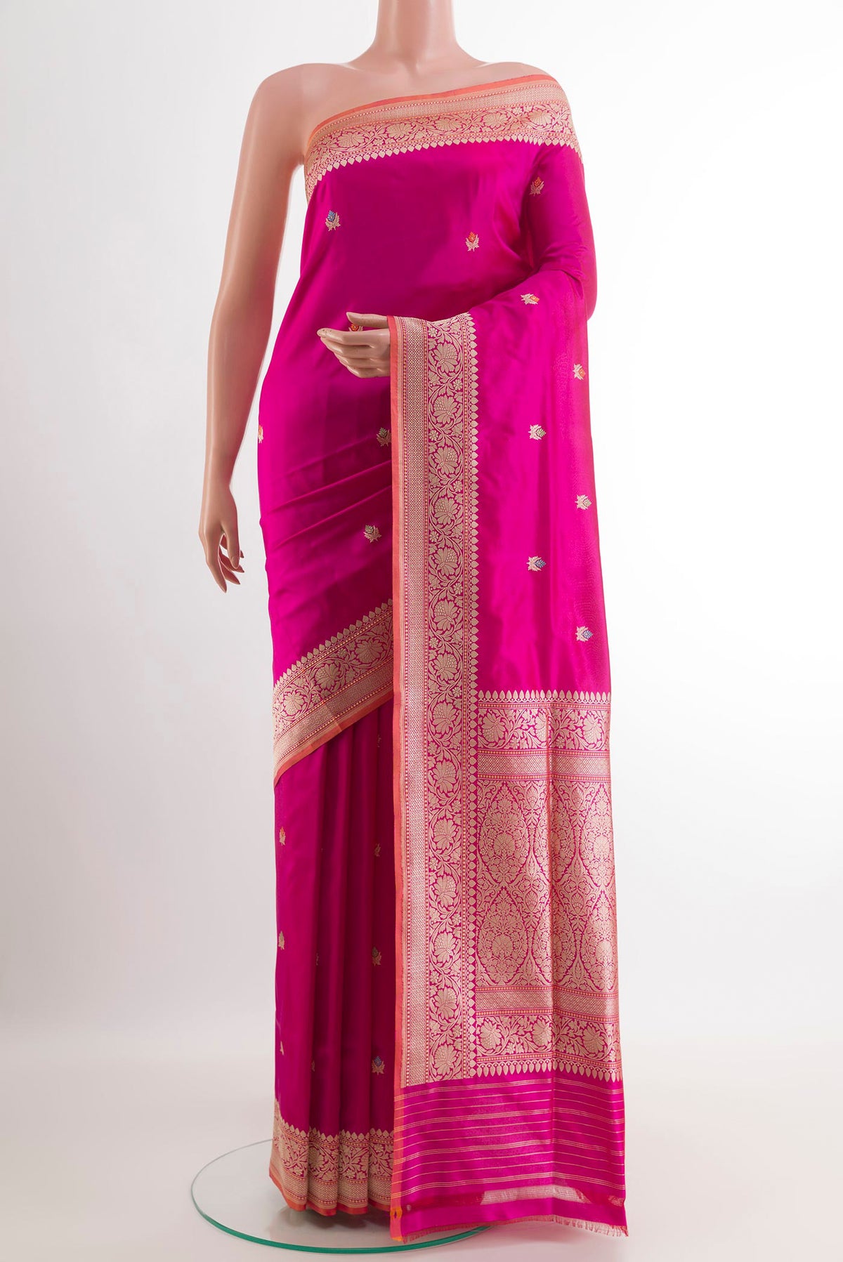 Pink Banarasi Silk Saree with Zari Butta on the body and Zari Border.  displayed on a mannequin