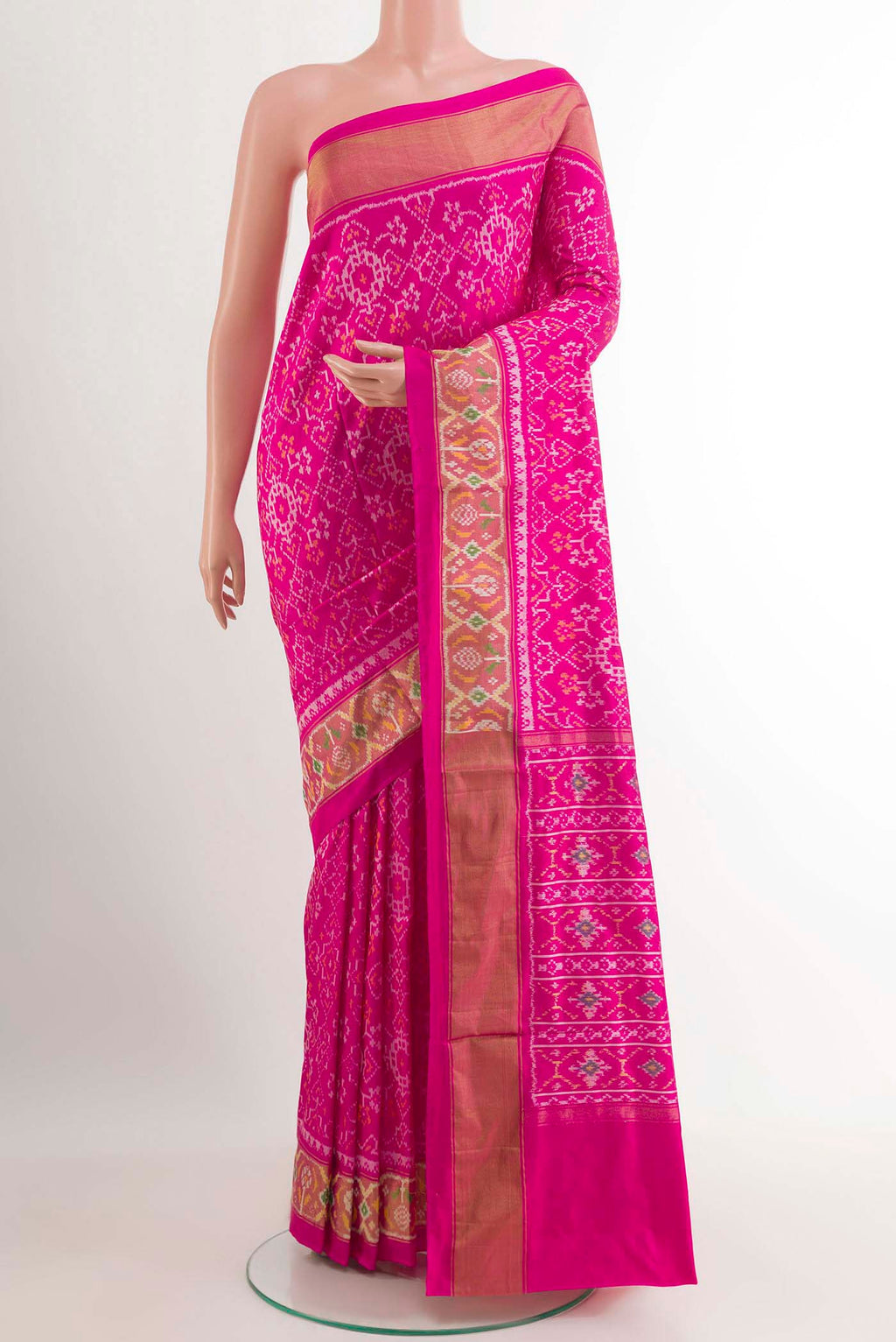 Pink Pochampally Silk Saree with Pure Ikat on the body and Zari Border.  displayed on a mannequin