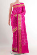 Pink Pochampally Silk Saree with Pure Ikat on the body and Zari Border.  displayed on a mannequin
