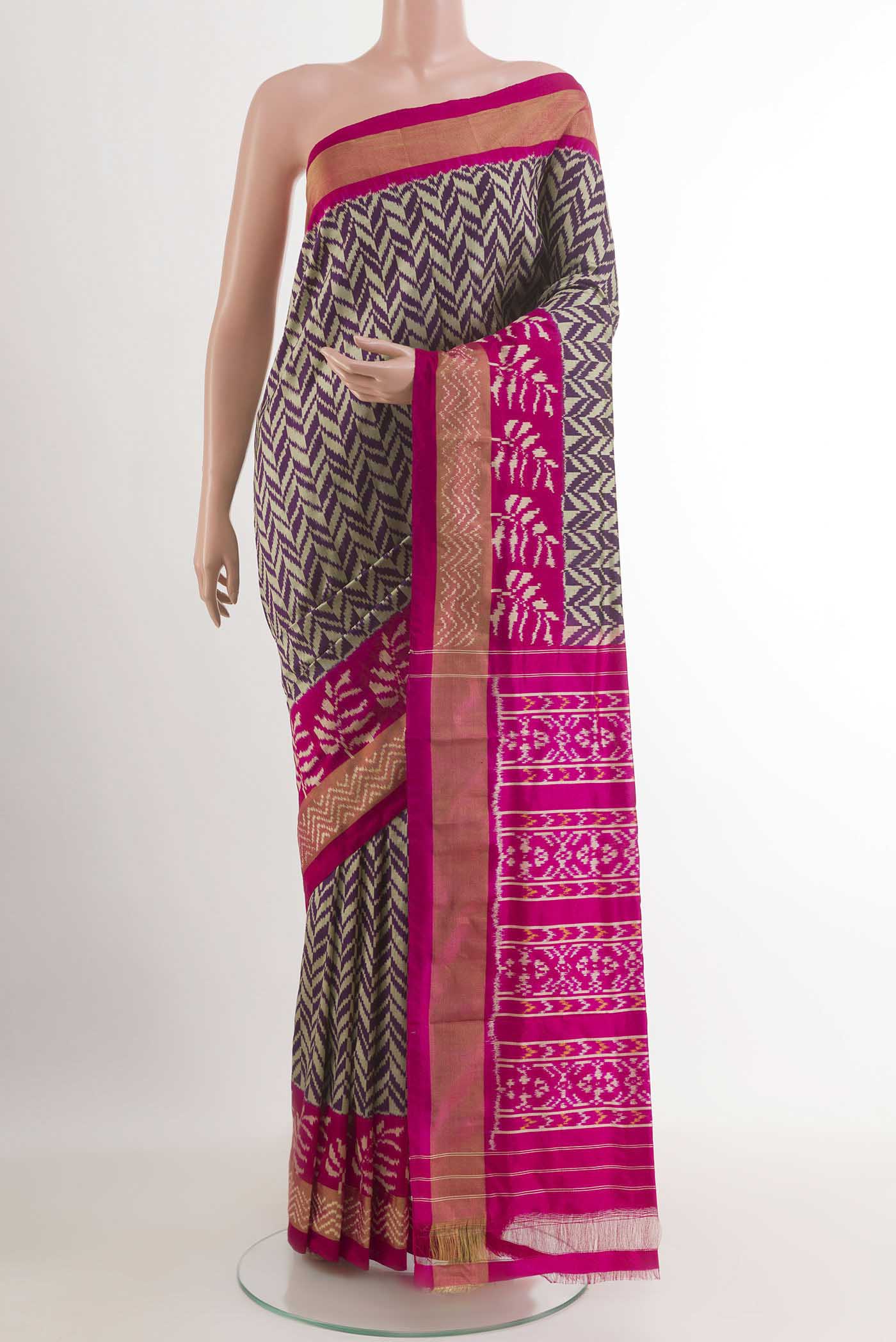 Purple Pochampally Silk Saree with Pure Ikat on the body and Zari Border.  displayed on a mannequin