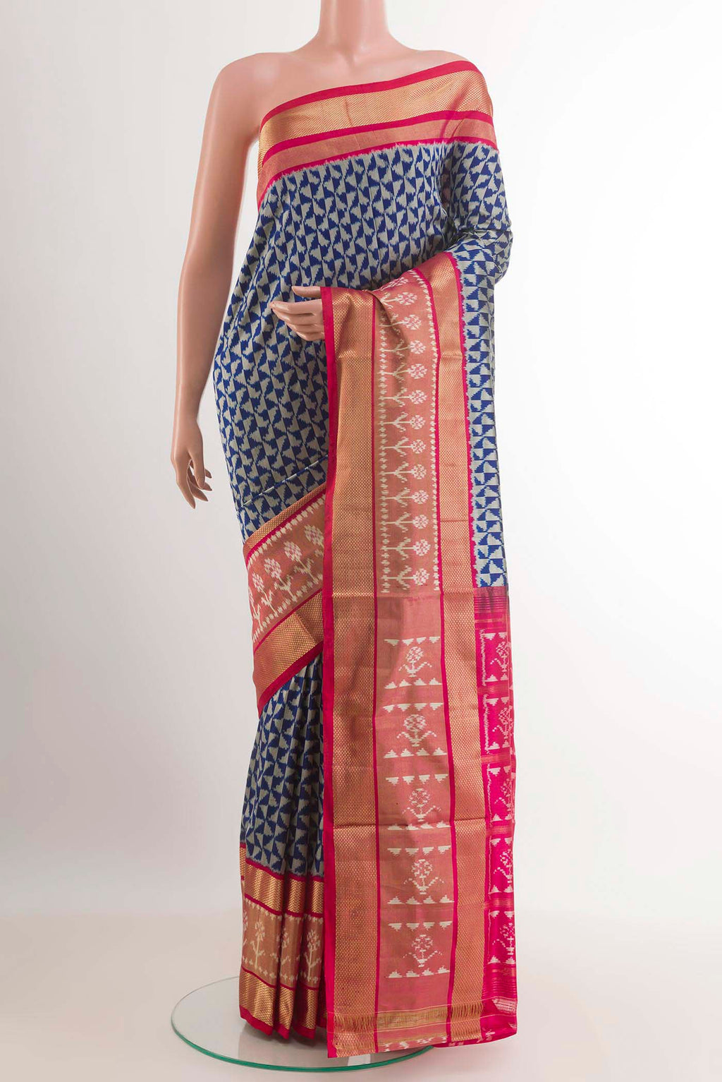 Blue Pochampally Silk Saree with Pure Ikat on the body and Zari Border.  displayed on a mannequin