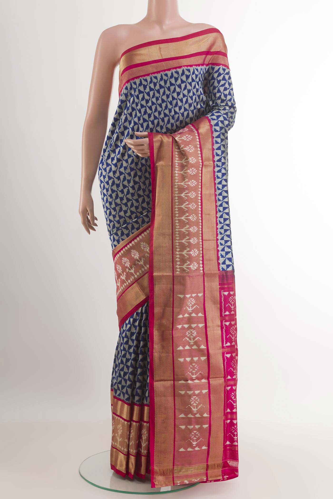 Blue Pochampally Silk Saree with Pure Ikat on the body and Zari Border.  displayed on a mannequin
