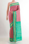 Pink Pochampally Silk Saree with Pure Ikat on the body and Zari Border.  displayed on a mannequin