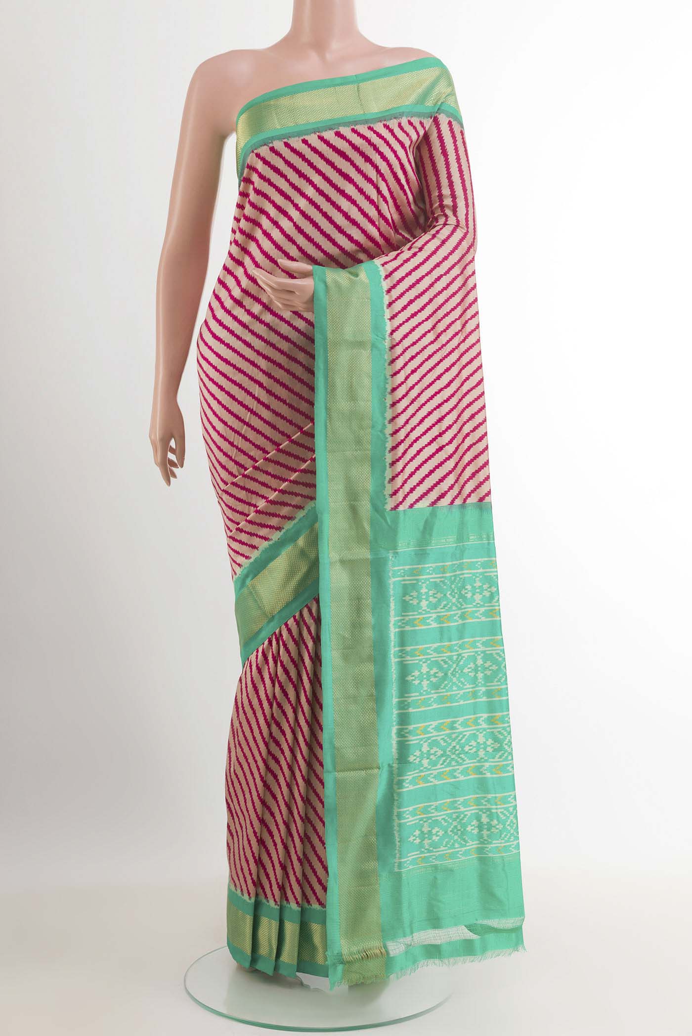 Pink Pochampally Silk Saree with Pure Ikat on the body and Zari Border.  displayed on a mannequin
