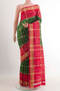 Green Pochampally Silk Saree with Pure Ikat on the body and Zari Border.  displayed on a mannequin