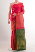 Red Kanjivaram Saree with Zari Butta on the body and Zari Border.  displayed on a mannequin