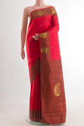 Red Kanchipuram Silk Saree with Zari Butta on the body and Zari Border.  displayed on a mannequin