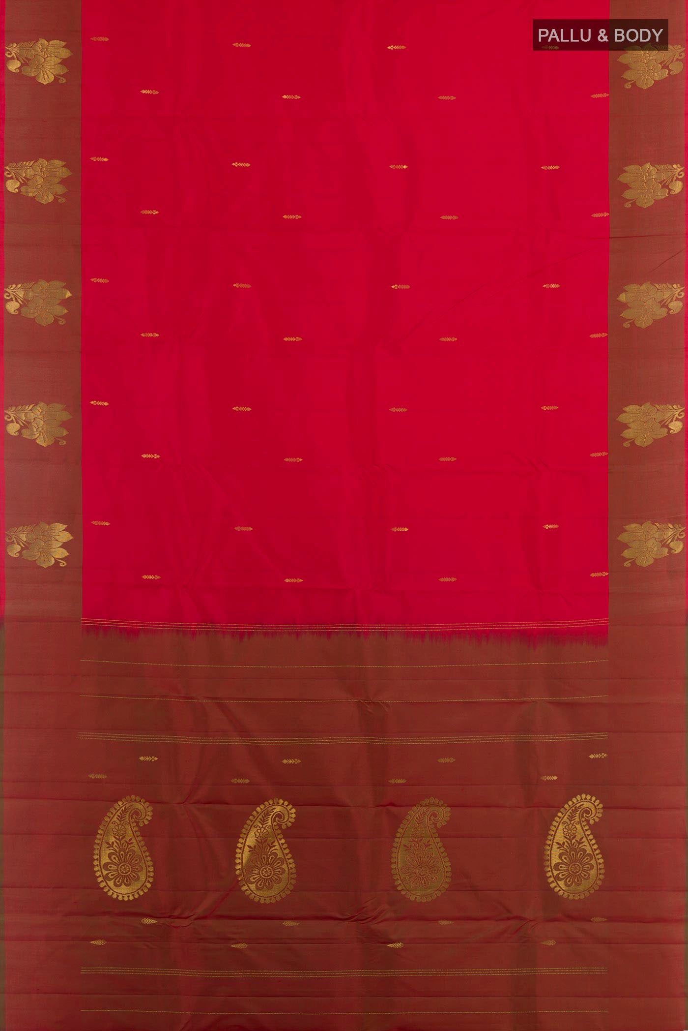 Flat view of Red Kanchipuram Saree with Zari Butta on the body and Zari Border. 