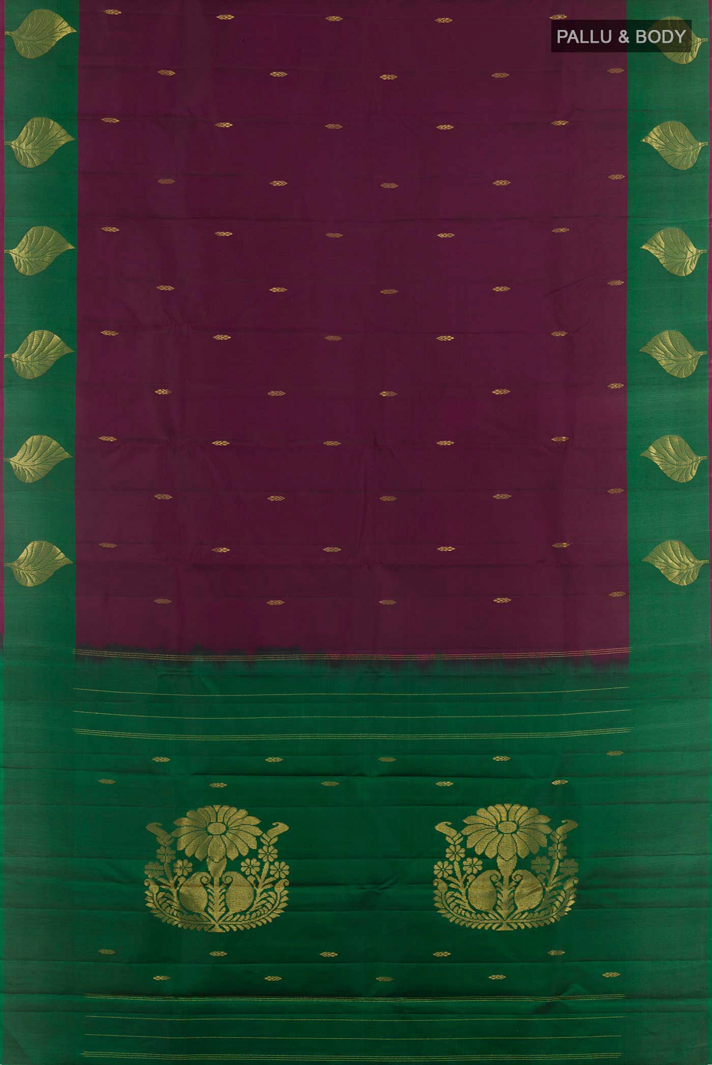 Flat view of Purple Kanchipuram Silk Saree with Zari Butta on the body and Zari Border. 