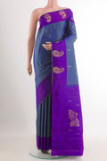 Blue Grey Kanchipuram Silk Saree with Zari Brocade on the body and Zari Border.  displayed on a mannequin