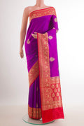 Purple Banarasi Katan Silk Saree with Zari Butta on the body and Zari Border.  displayed on a mannequin