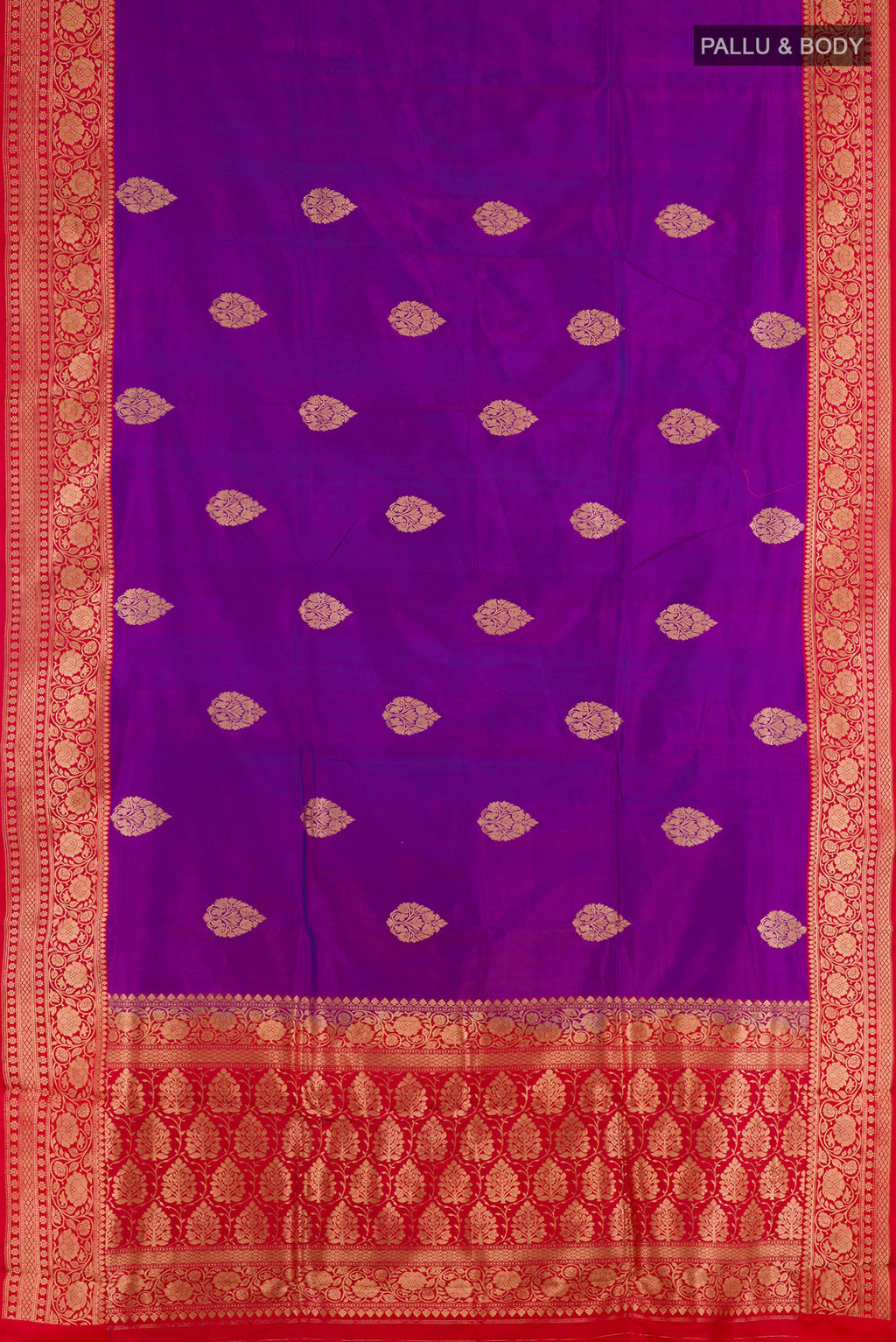 Flat view of Purple Banarasi Katan Silk Saree with Zari Butta on the body and Zari Border. 