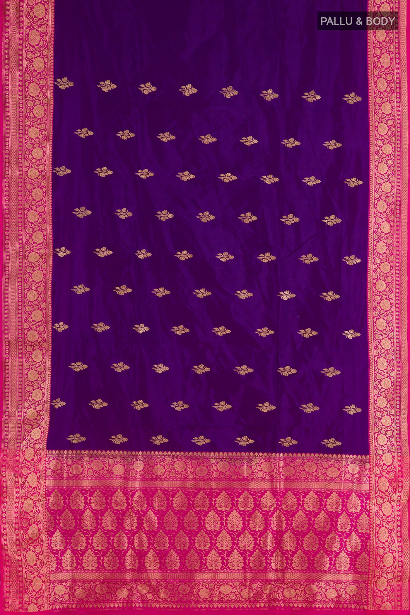 Flat view of Purple Banarasi Katan Silk Saree with Zari Butta on the body and Zari Border. 