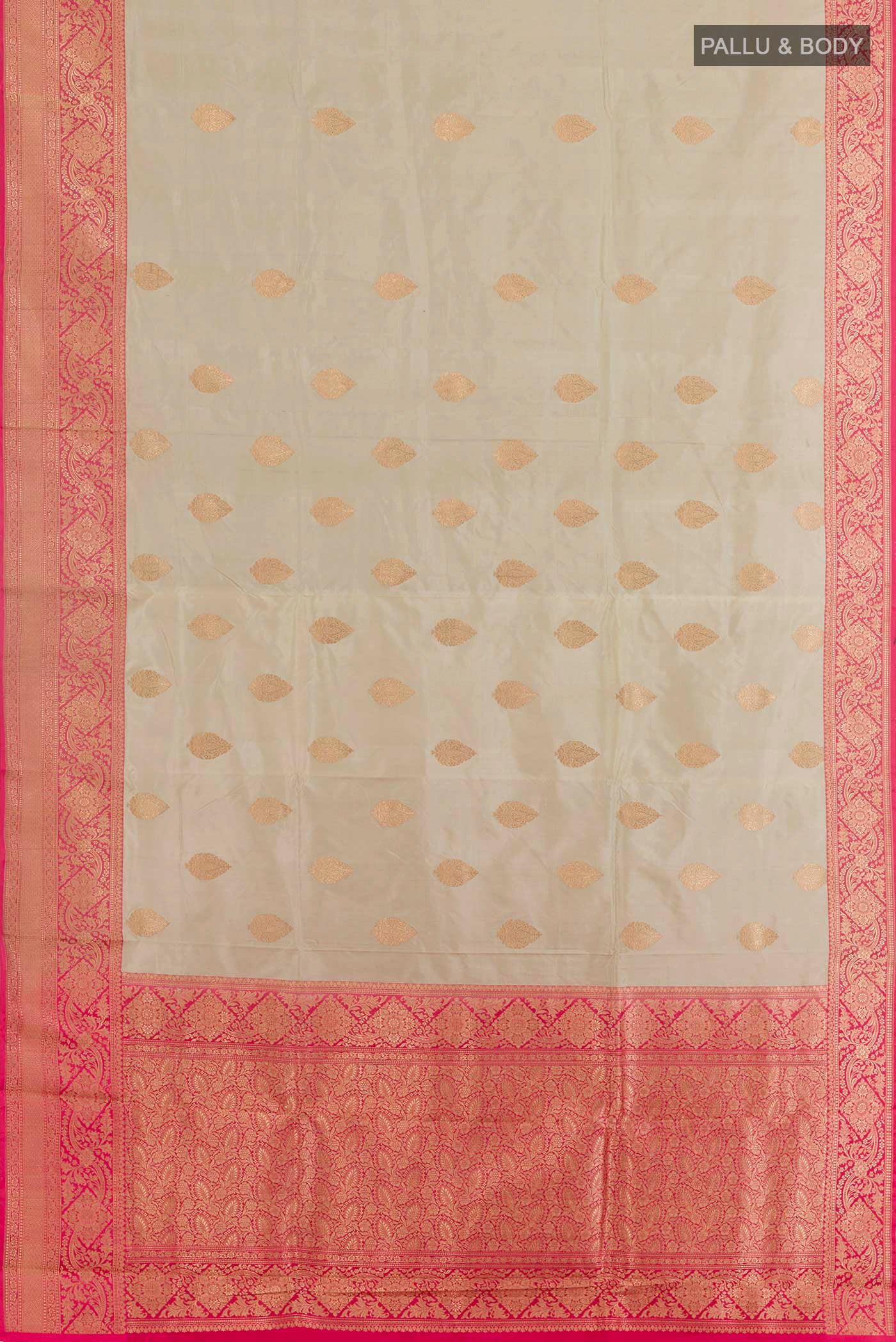 Flat view of Grey Banarasi Katan Silk Saree with Zari Butta on the body and Zari Border. 