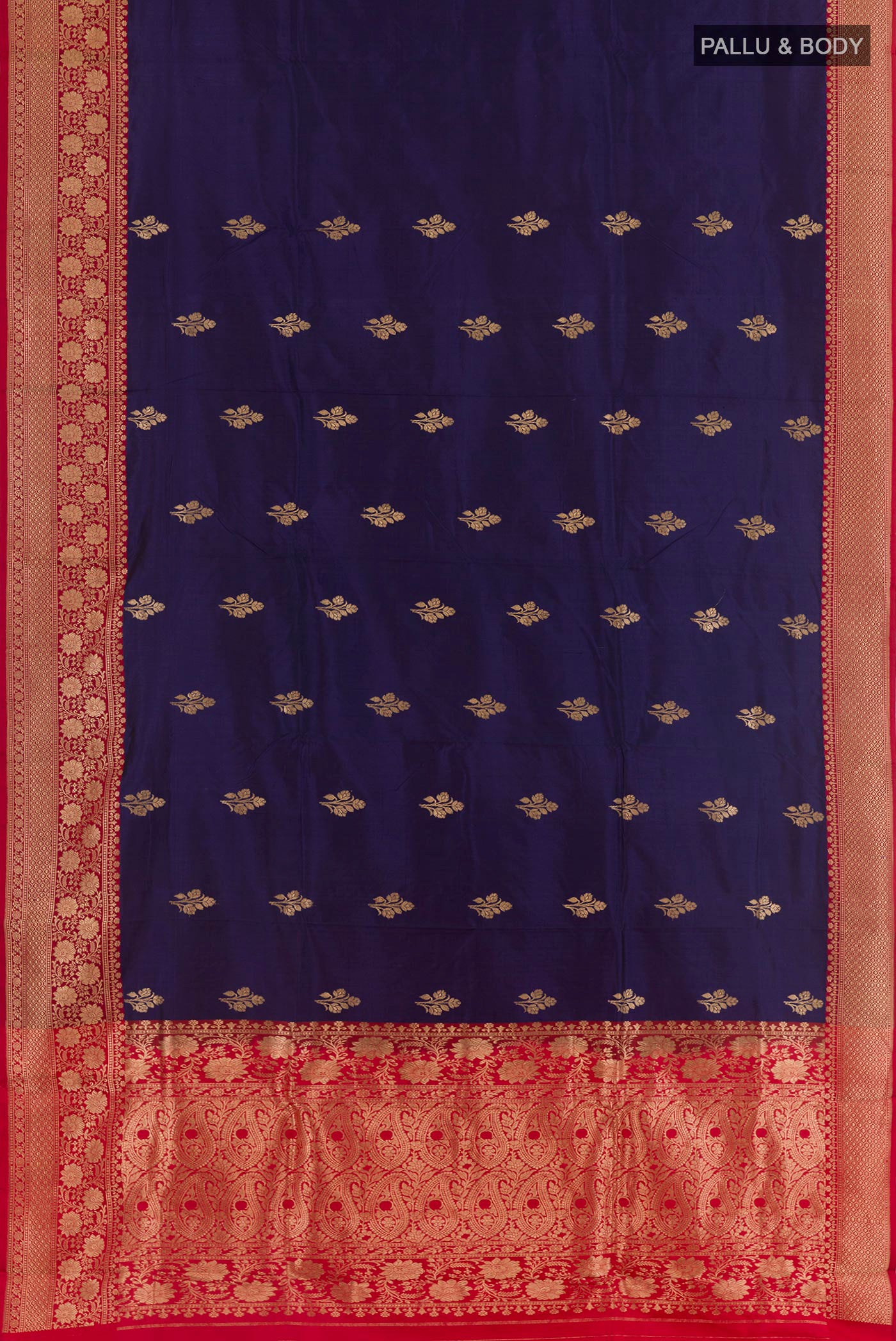 Flat view of Navy Blue Banarasi Katan Silk Saree with Zari Butta on the body and Zari Border. 