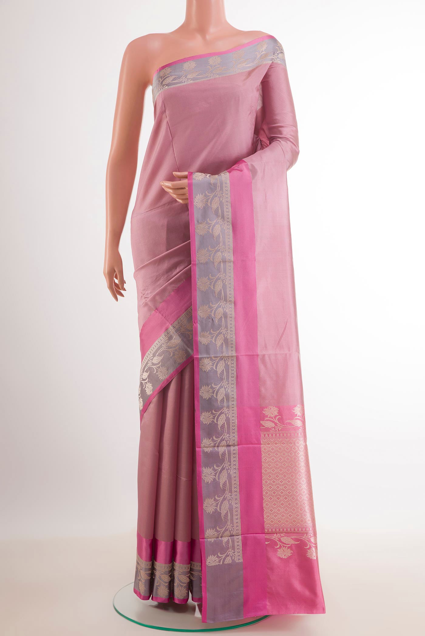 Imperial Pink Banarasi Katan Silk Saree with Zari Butta on the body and Zari Border.  displayed on a mannequin