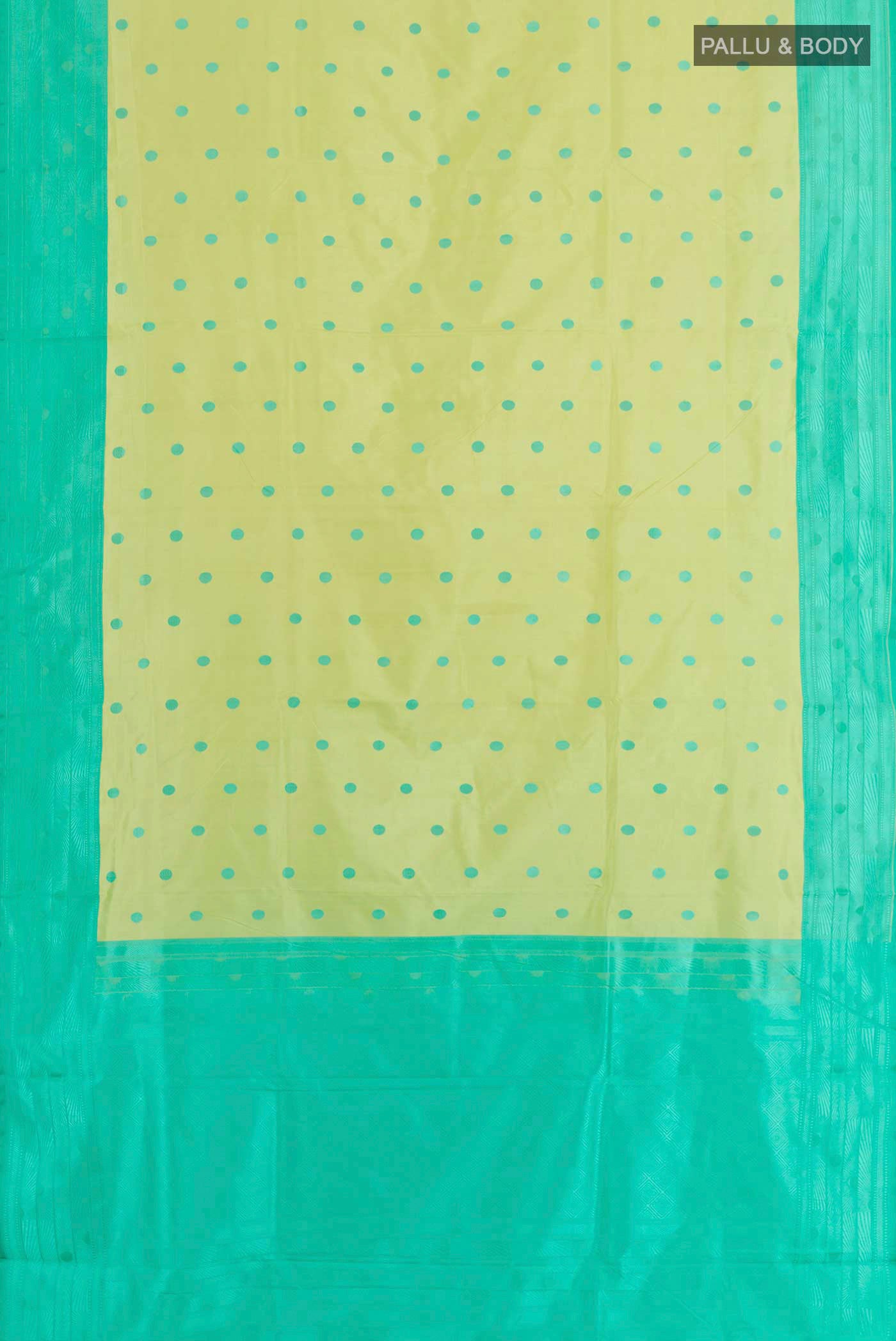 Flat view of Lemon Yellow Soft Silk Saree with Thread Butta on the body and Embroidery Border. 