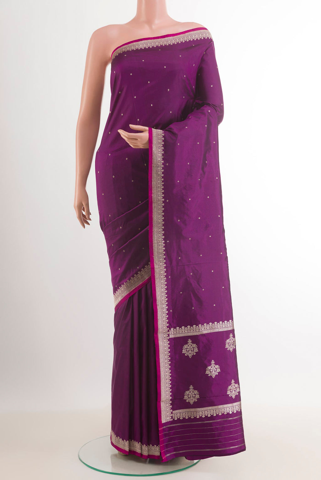 Purple Banarasi Katan Silk Saree with Plain Body and Zari Border.  displayed on a mannequin