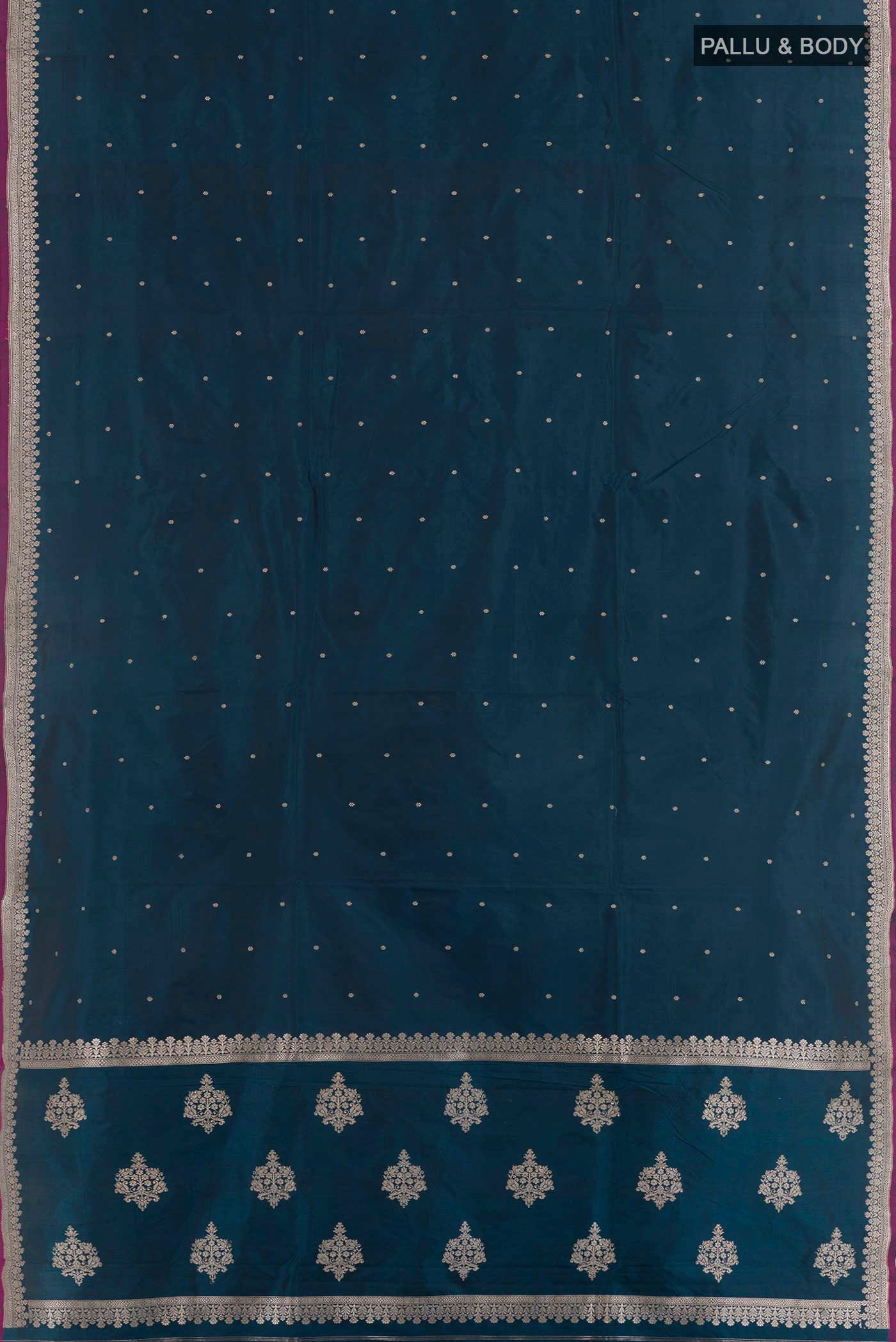 Flat view of Royal Blue Banarasi Katan Silk Saree with Plain Body and Zari Border. 