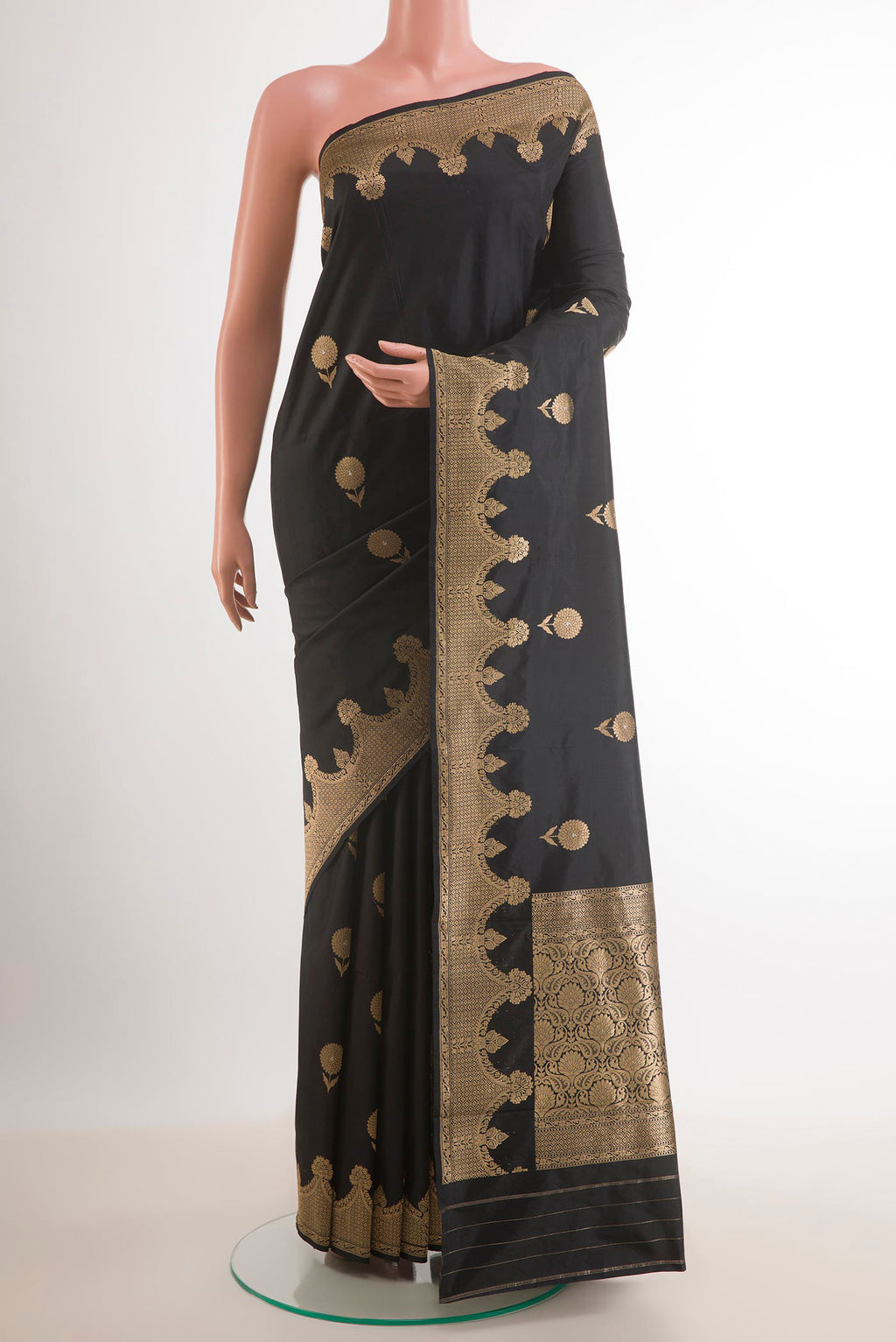 Black Banarasi Katan Silk Saree with Zari Butta on the body and Zari Border.  displayed on a mannequin