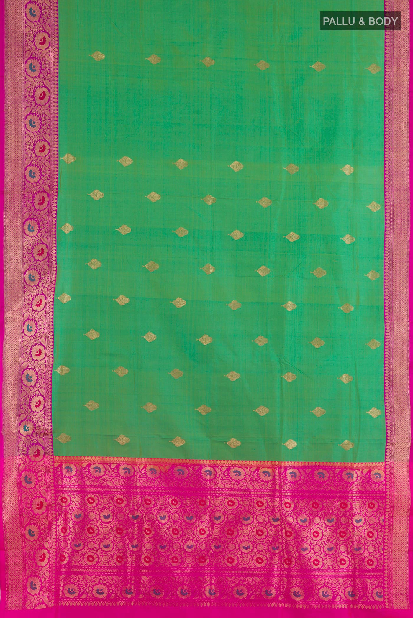 Flat view of Green Banarasi Katan Silk Saree with Zari Butta on the body and Zari Border. 