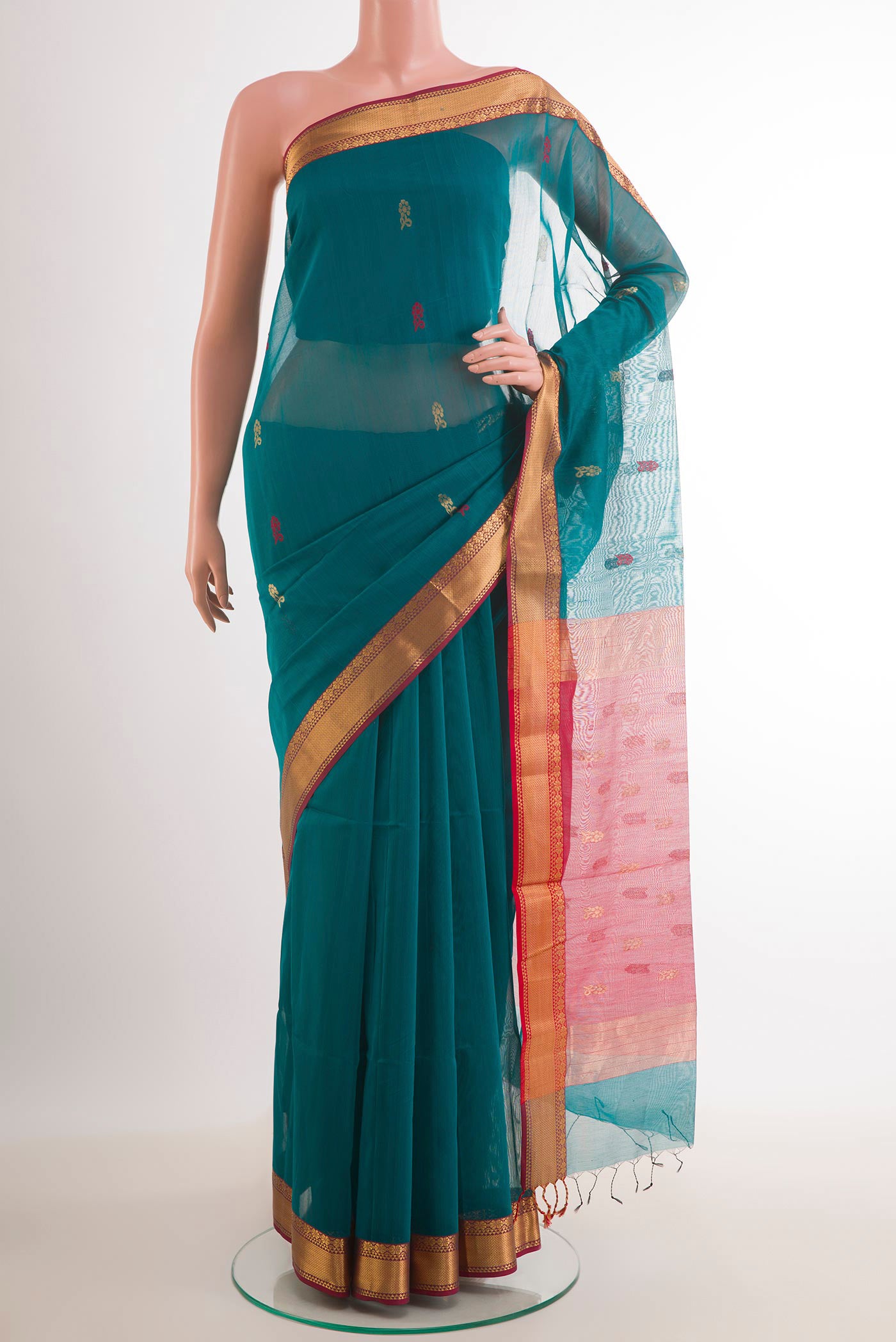 Blue Blended Kora Cotton Saree with Zari Butta on the body and Zari Border.  displayed on a mannequin