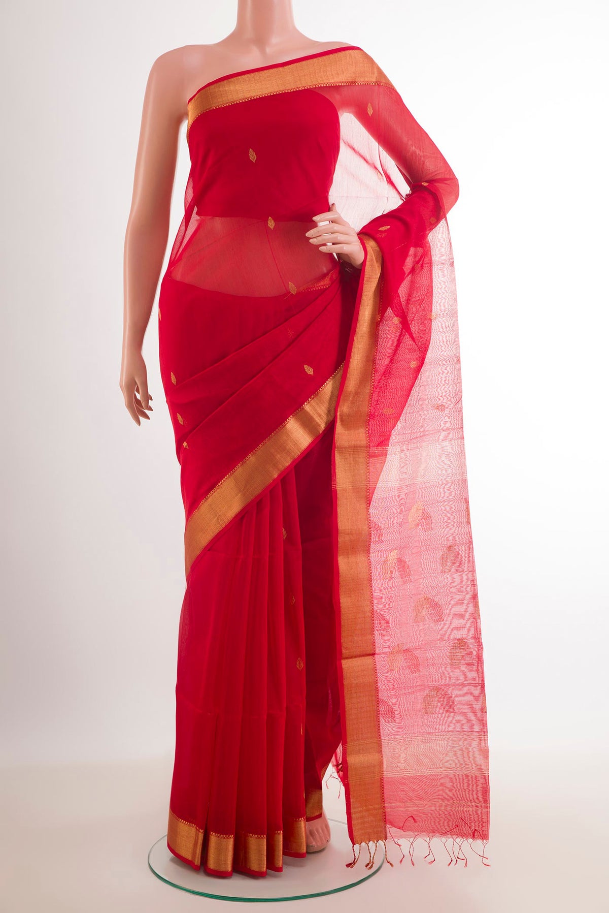 Red Blended Kora Cotton Saree with Zari Butta on the body and Zari Border.  displayed on a mannequin