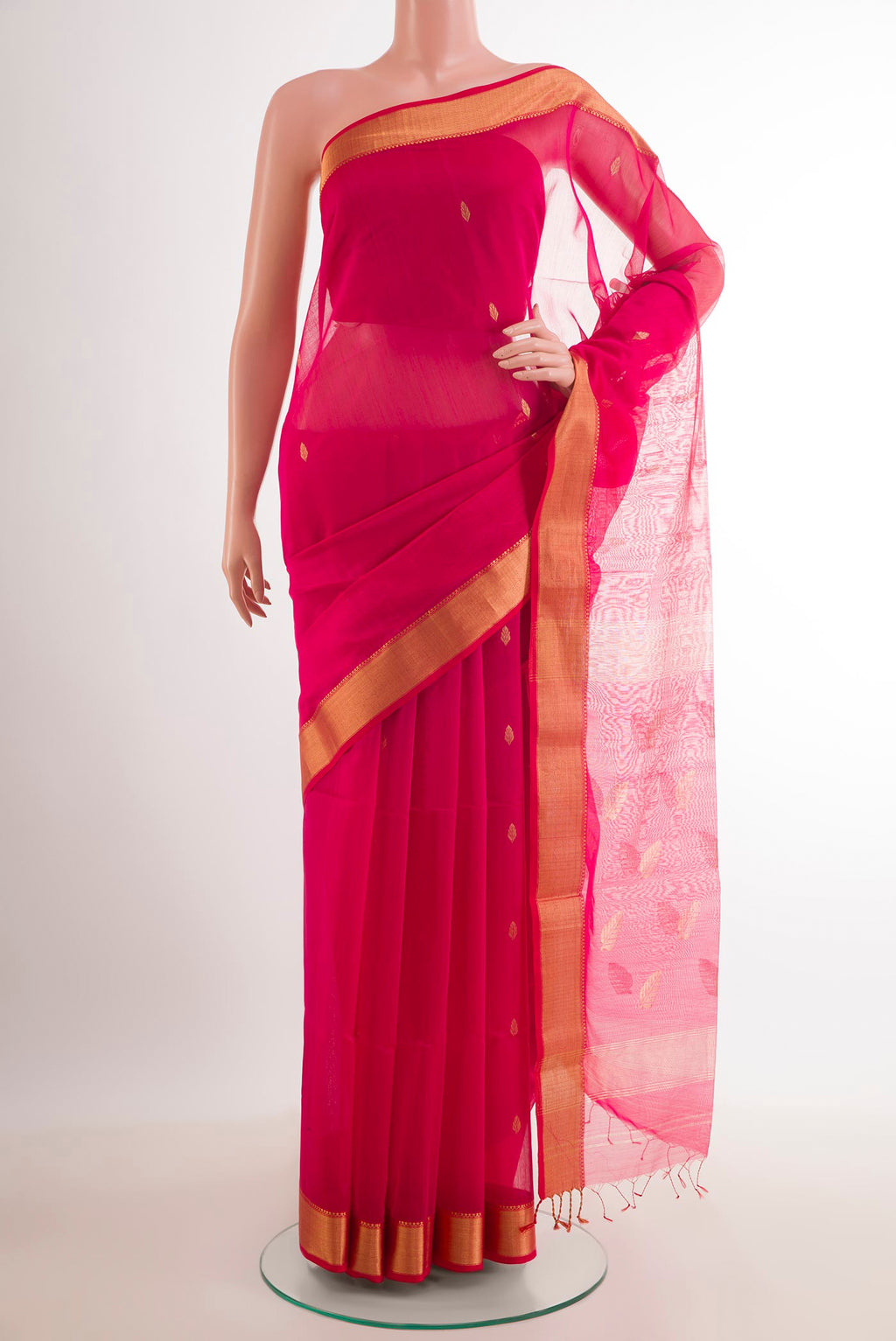Red Blended Kora Cotton Saree with Zari Butta on the body and Zari Border.  displayed on a mannequin