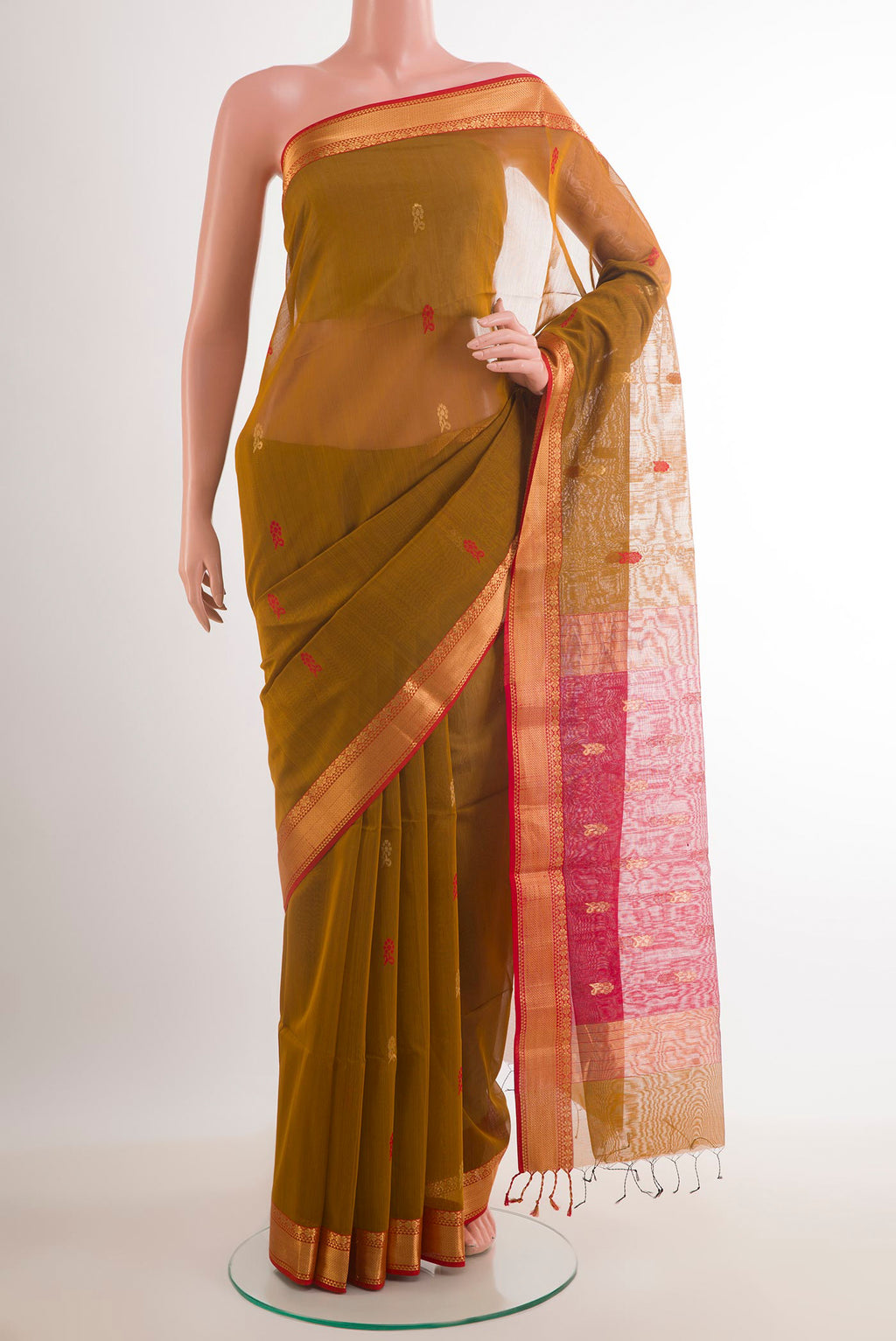 Mustard Blended Kora Cotton Saree with Zari And Thread Butta on the body and Zari Border.  displayed on a mannequin