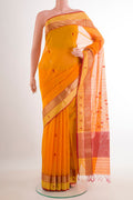 Mustard Blended Kora Cotton Saree with Zari And Thread Butta on the body and Zari Border.  displayed on a mannequin