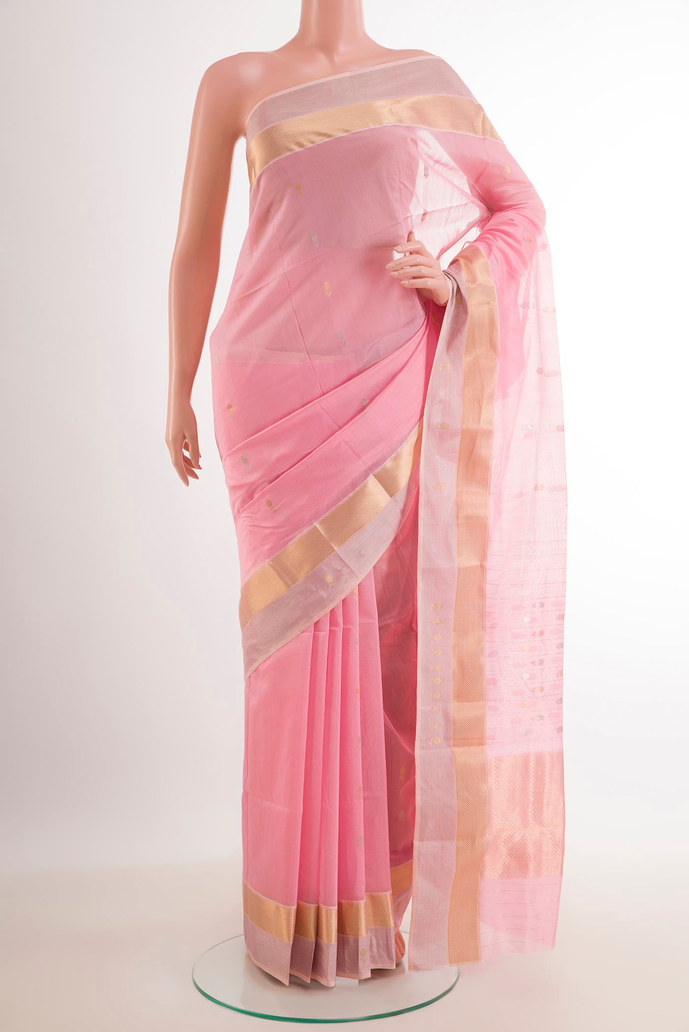 Pink Blended Kora Cotton Saree with Zari Butta on the body and Zari Border.  displayed on a mannequin