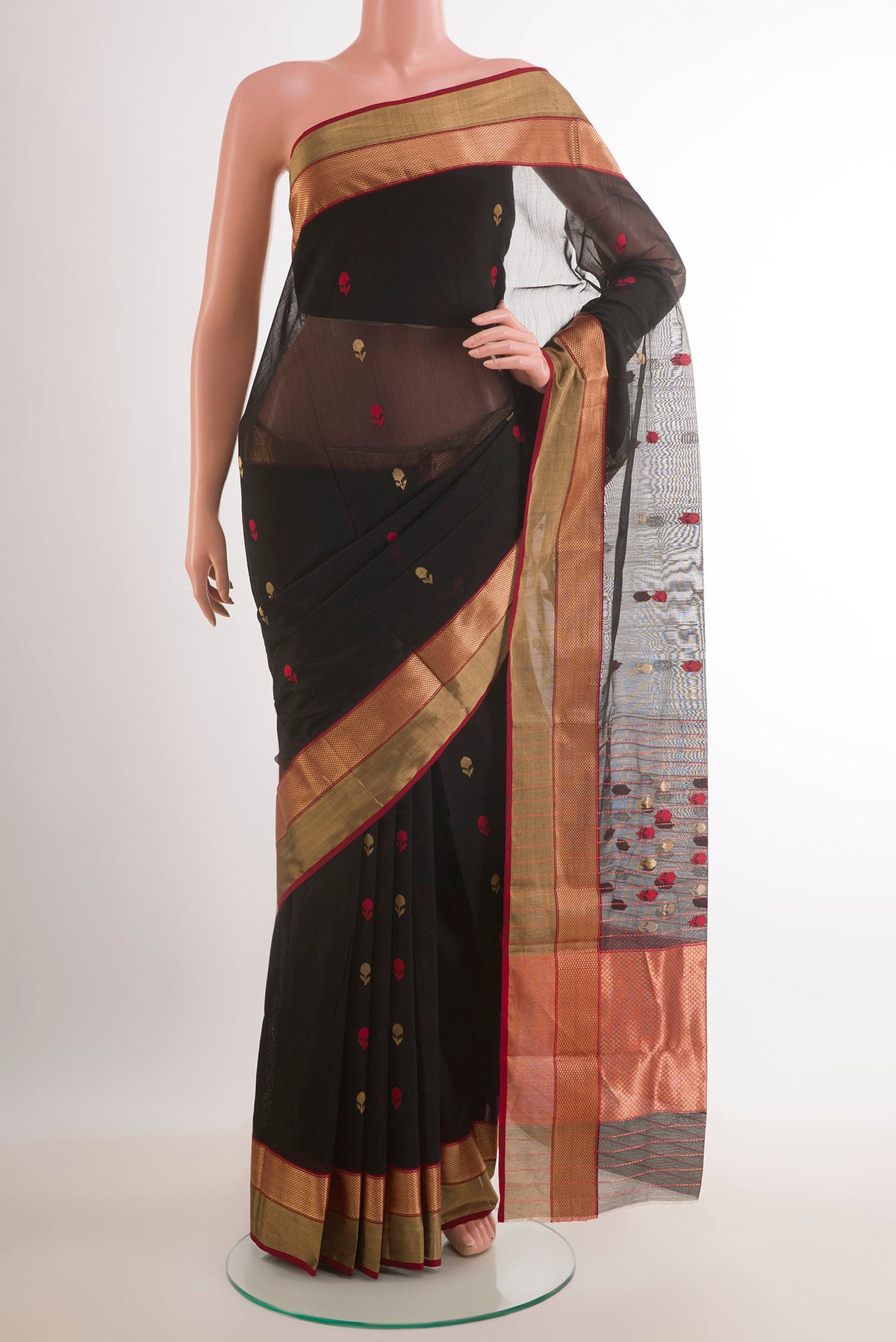Black Blended Kora Cotton Saree with Zari Butta on the body and Zari Border.  displayed on a mannequin